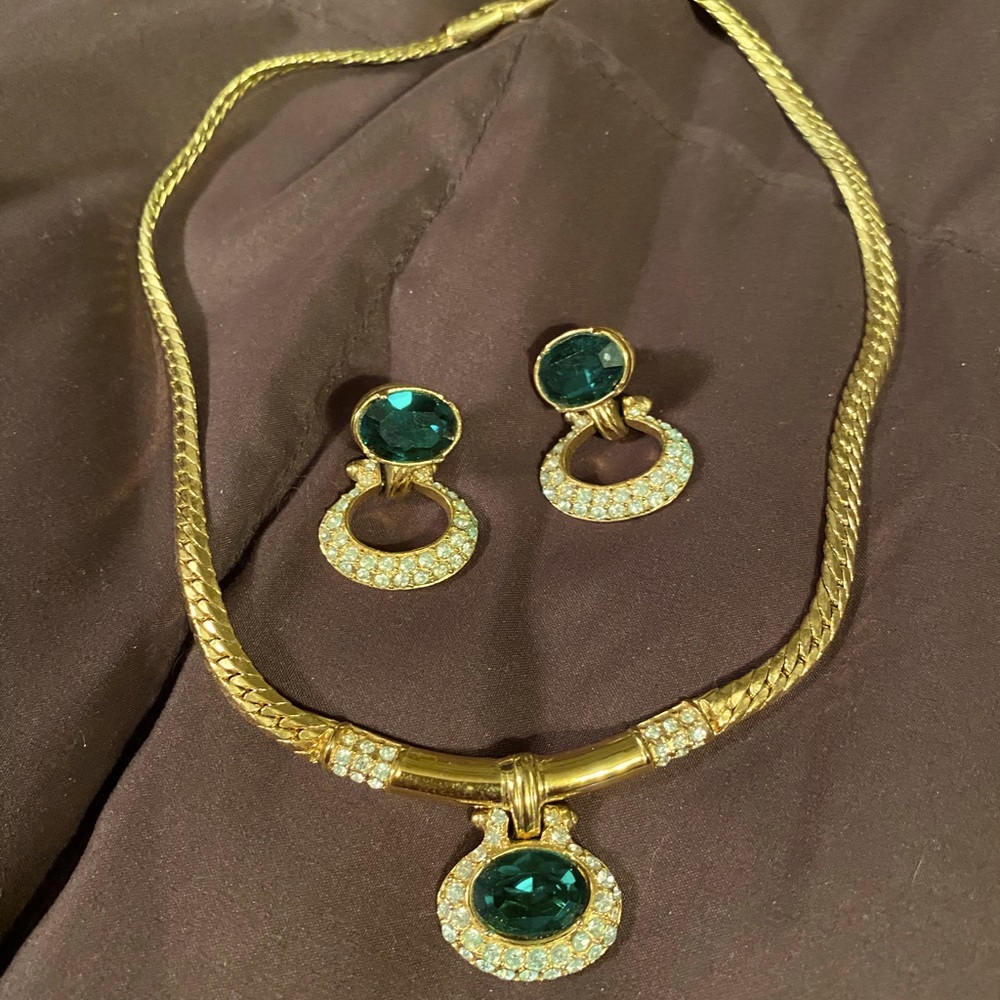 Man made emerald stone necklace and earrings set.